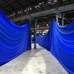 blue polyester walk through event the look drape hire