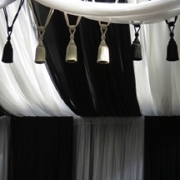 black and white tassels and chiffon draping the look drape hire 